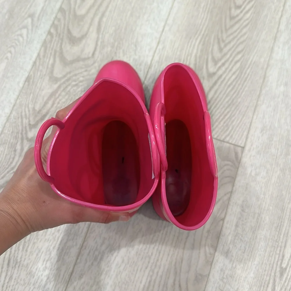 Pink rain boots